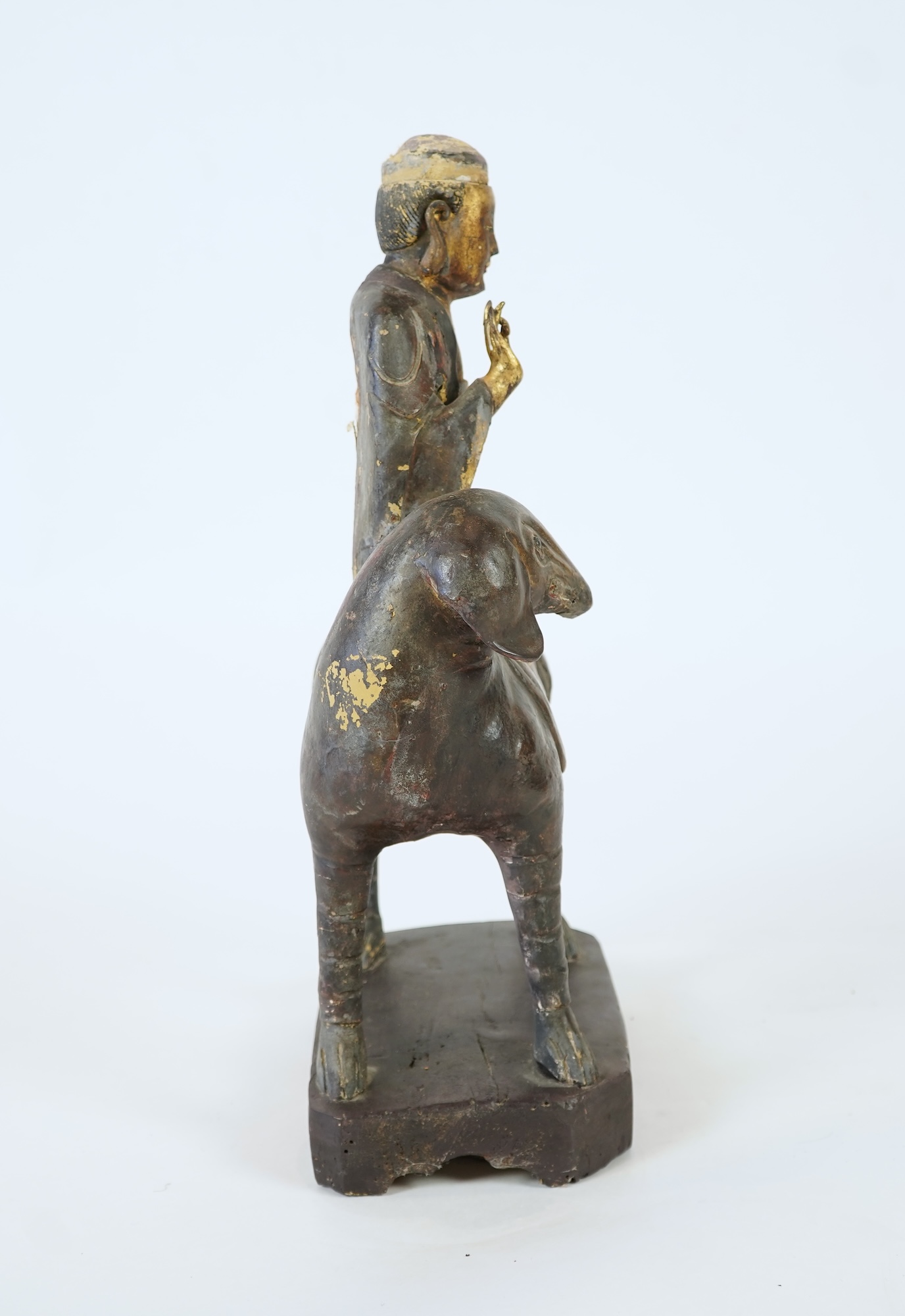 A large Chinese gilt and polychrome lacquered stucco work and wood figure of Samantabhadra on an elephant, Yuan-Ming dynasty